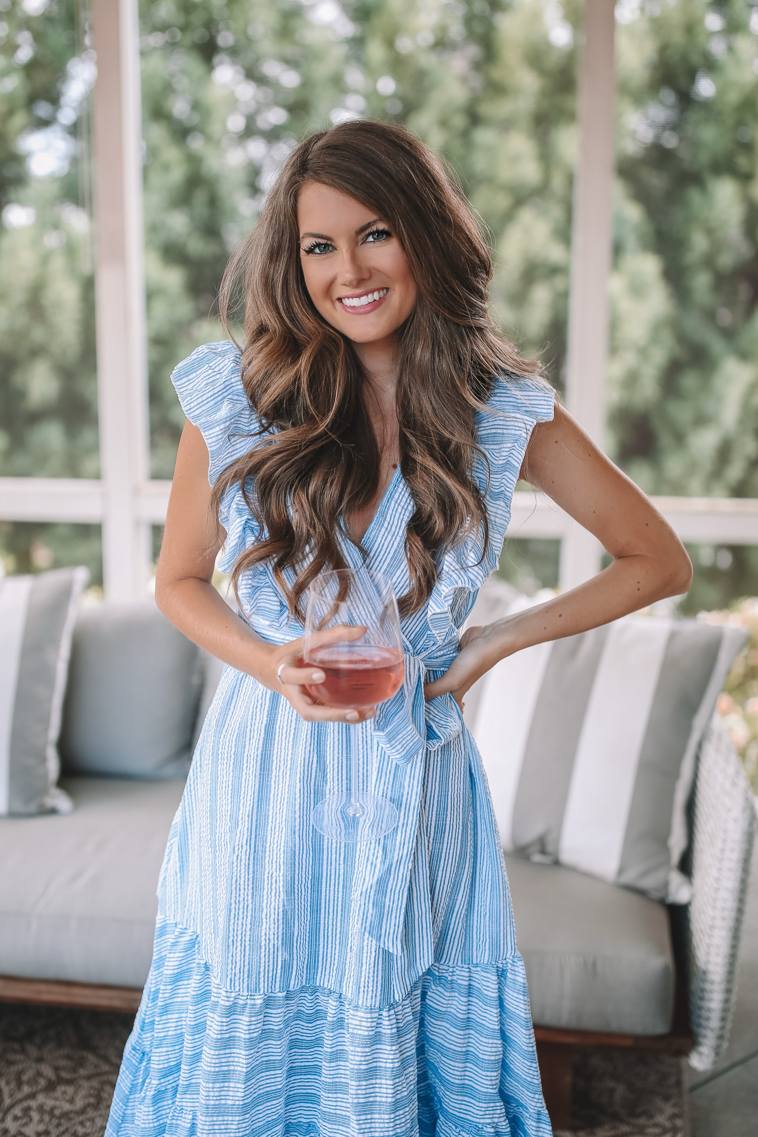 https://www.southerncurlsandpearls.com/wp-content/uploads/2020/06/amazon-fashion-finds-blue-and-white-striped-dress-ruffle-sleeves-6.jpg