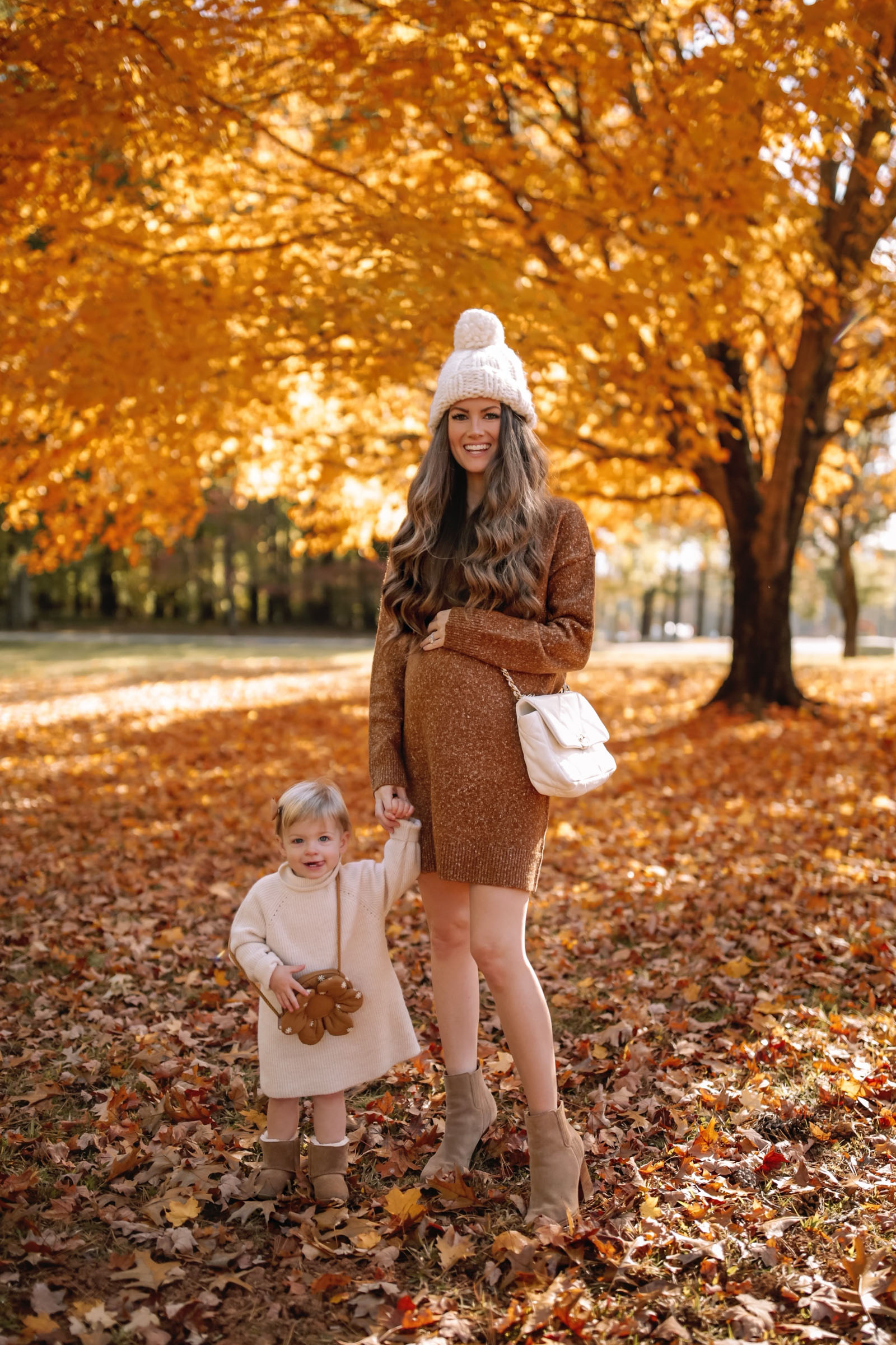https://www.southerncurlsandpearls.com/wp-content/uploads/2022/11/nordstrom-sweater-dress-toddler-UGG-boots-chunky-beanie-christian-girl-autumn-7.jpg